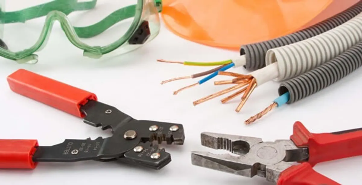 Electrical wiring repair with professional tools and safety equipment in Pleasant Grove, AL