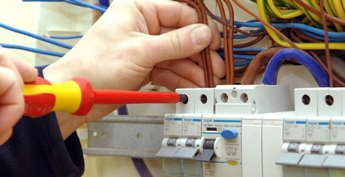 electrician services performing professional electrical panel wiring and connections in Birmingham, AL